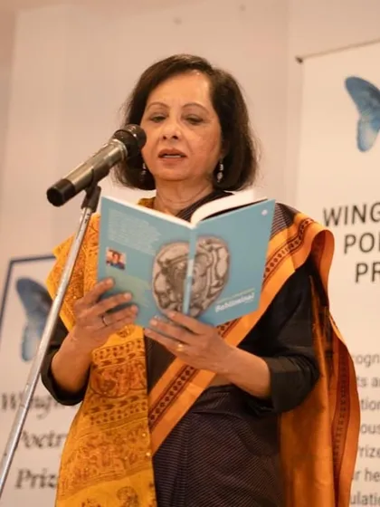 A distinguished guest reading from a book of winning poems at the Wingword Poetry Prize ceremony. Publication is a key part of the recognition we offer.