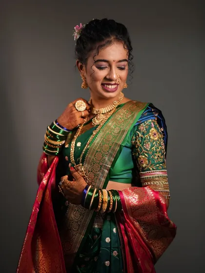A candid shot of the bride smiling, showing the natural and joyful look I aim for.