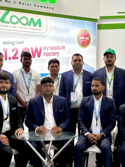 A formal team photo at our booth. My team's professionalism and expertise are the foundation of my company's success.