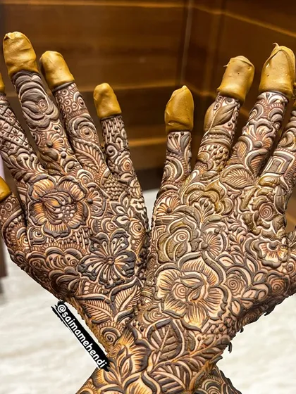 A beautiful, clean shot of a full-hand design, where you can see the incredible detail and precision of the floral and geometric patterns.