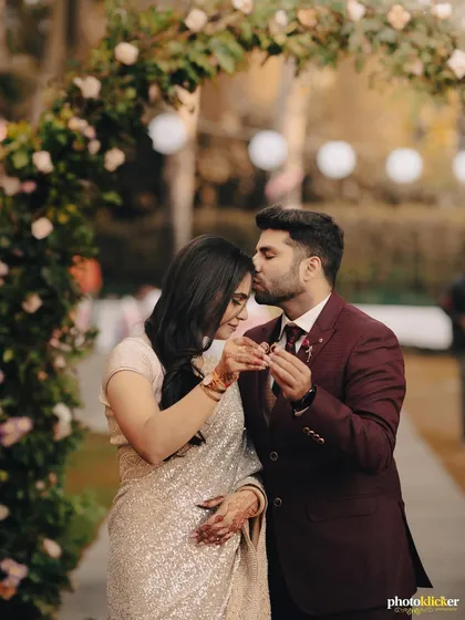 A tender moment right after the ring exchange, as the groom kisses his fiancée's forehead. These are the sweet, emotional details we focus on.