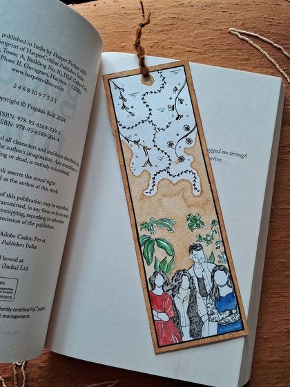 This is a custom bookmark I created as a gift for a friend. It combines a portrait of our friend group with abstract floral patterns, all tied together with coffee stains.