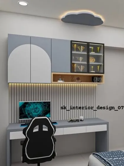 A teenager's dream study corner, complete with a gaming chair and a desk with overhead cabinets. The glass-fronted cabinet is perfect for displaying trophies and collectibles.