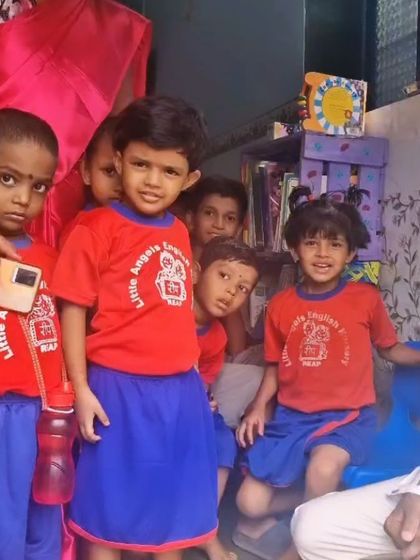 Young children at the REAP Center, excited about their new books. Our collaboration ensures that even more children have access to the transformative power of stories.