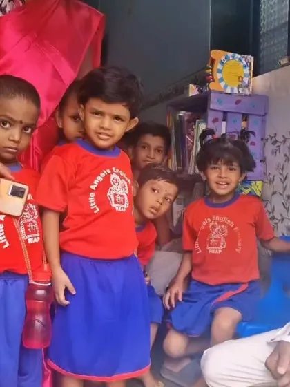 Young children at the REAP Center, ready to dive into their new books. Our goal is to make stories accessible to every child, regardless of their circumstances.