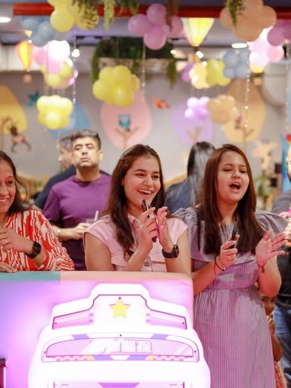 Parents watch the party activities with smiles on their faces. We design our parties to be enjoyable for the adults too, so you can relax and see your child's joy.