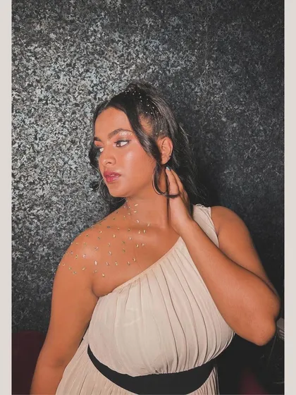 A creative and glamorous party look. I used body glitter and face gems to create a sparkling, ethereal effect, perfect for a themed party or a creative photoshoot.