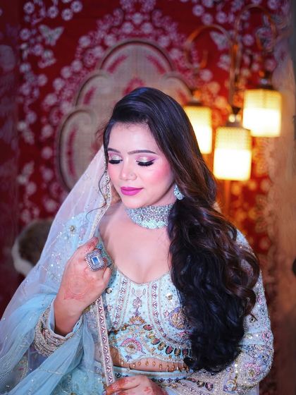 A close-up on the makeup and diamond choker. This look is perfect for a modern bride who wants a touch of tradition.