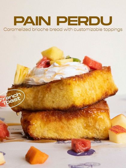 My Pain Perdu features thick, caramelized brioche bread with customizable toppings. This version is served with a medley of exotic fruits for a fresh, sweet finish.