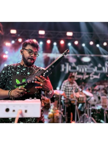 Our keyboardist, focused on his instrument during the sound check.