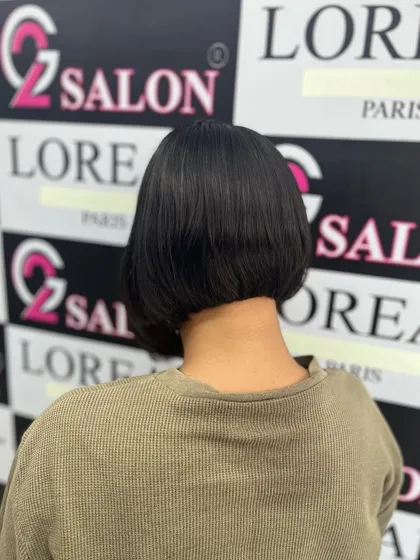 The back view of the precision bob cut, showcasing the sharp, clean line that is the hallmark of a great bob.