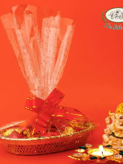 A decorative oval tray filled with our crunchy and delicious assorted chocolate rocks, perfect as a Diwali gift.