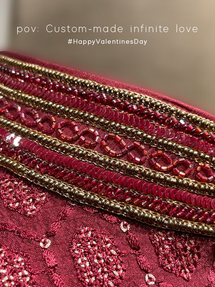 A close-up of the 'Infinite Love' bandi collar. The infinity symbol was a design concept from the father of the bride to portray the infinite love shared within their family.