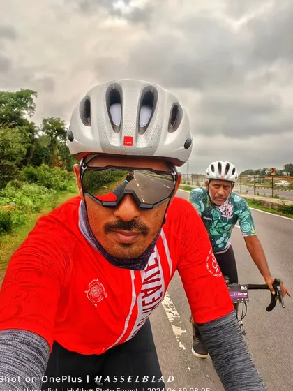 Riding side-by-side with a fellow cyclist. These are the moments of connection and shared passion that define our club.