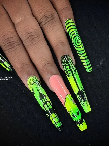 A full view of the neon green Halloween nail art, with each long nail featuring a different spooky design like a haunted house, skull, or spiderweb.