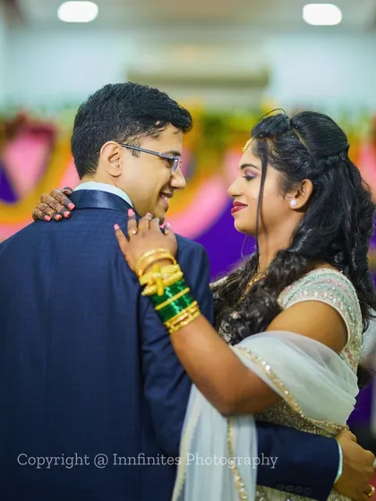A candid moment during a dance. This photo captures the simple joy and connection between the couple as they enjoy their reception.