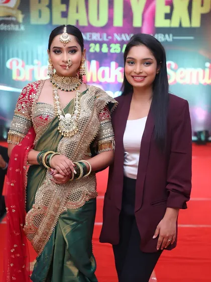 A proud moment with our model after a successful live demonstration at the Beauty Expo. We love sharing our passion for traditional artistry with a wider audience.