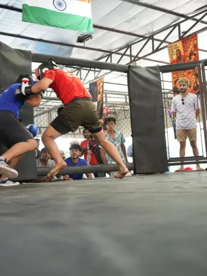 Clinch work against the cage wall. This is where fights are won and lost, testing your strength, balance, and ability to control the opponent in close quarters.