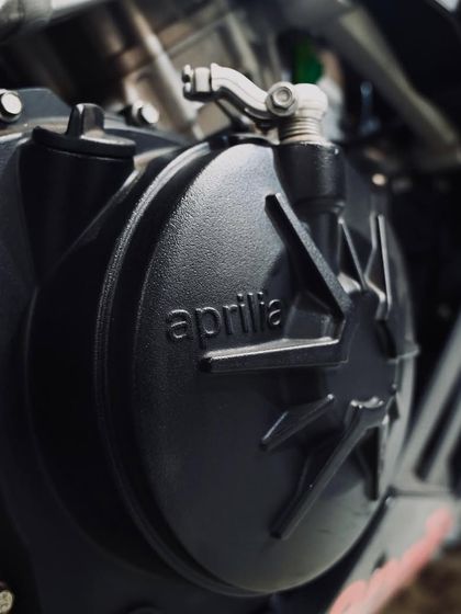 A close-up of the Aprilia engine casing.