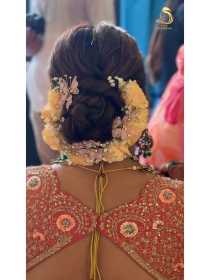 The full view of the bun, showing how the accessories create a magical, fairytale look.