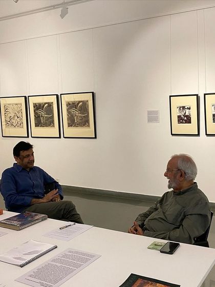 Another view of the conversation between Abhishek Poddar and Gulammohammed Sheikh.