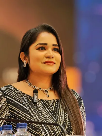 A moment of pride and focus while hosting the BitHarvest family event. My role is to ensure that every achiever's moment in the spotlight is impactful and that the event's energy remains high from start to finish.