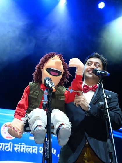 On stage in Leicester with my main partner, the puppet Bunty. This show was special because my wife and daughter also performed.