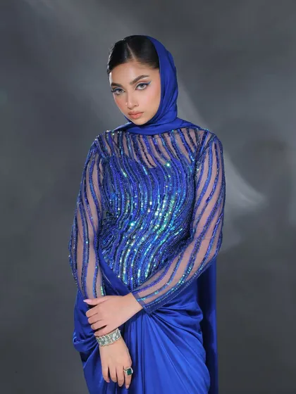 A final shot of this electric blue look. It's a testament to the power of bold, clean lines in makeup.