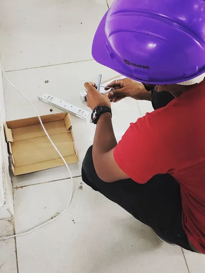 This image shows the detailed work of connecting the wiring for an access control system. We ensure all connections are secure and neatly managed to prevent future issues and simplify maintenance.
