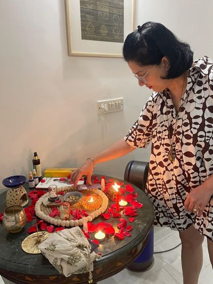 A participant setting an intention at our altar during a women's circle. These small rituals are a powerful way to ground our practice.