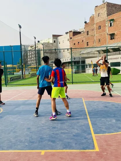 Players learn court awareness and defensive positioning during a half-court set. Understanding where to be on the floor is just as important as on-ball skills.