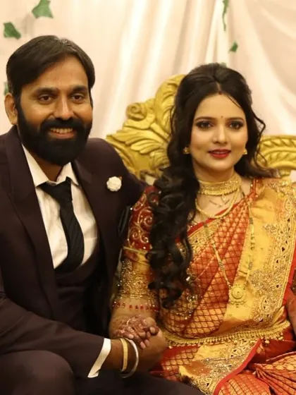 The couple seated at the event. The makeup is designed to look great in all lighting conditions.