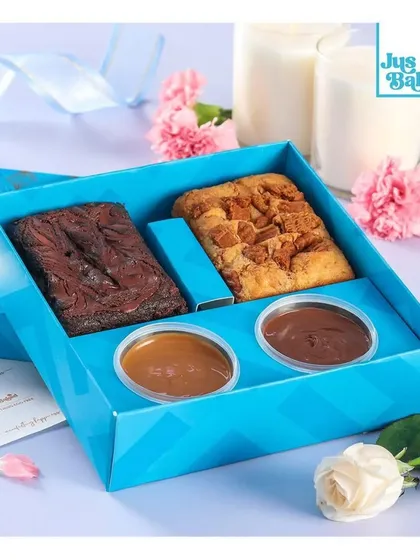 Our 'Tea Party Box' is perfect for Ganpati gatherings, with two types of brownies and two sweet dips.