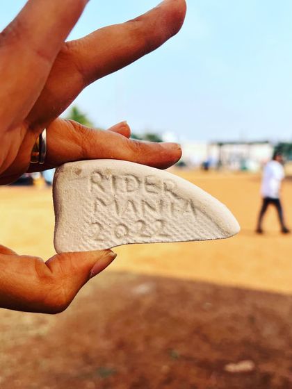 A participant carved "Rider Mania 2022" into a piece of stone as a souvenir from our workshop.