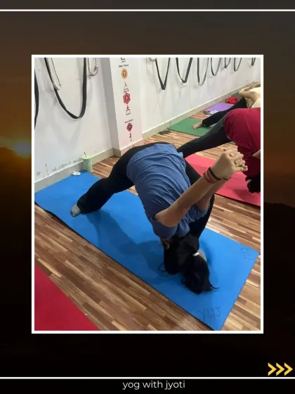 A student in a twisted forward bend, a variation of Shirsh Padangushthaan Asana, showing great flexibility.