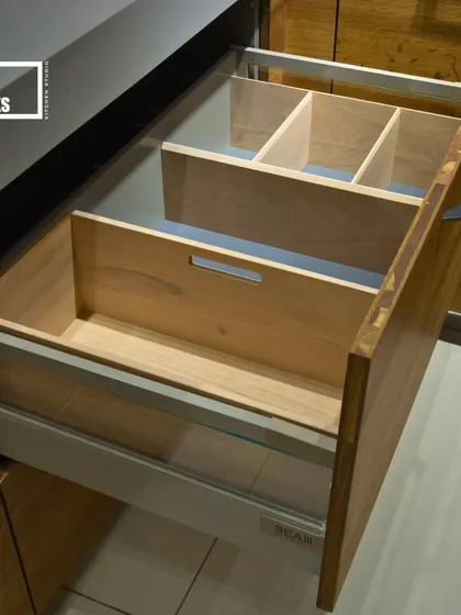 Custom wooden drawer organizers keep your cutlery and utensils neatly arranged. We design these to fit your specific needs.