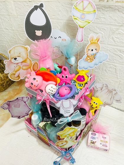 Another angle of the heart-shaped baby shower hamper, highlighting the cute animal and baby-themed cutouts that add a playful touch.