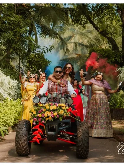 Who says a Haldi entry has to be traditional? I love bringing fun, quirky ideas to life, like this grand entrance on a flower-adorned ATV, complete with smoke bombs for that extra flair.