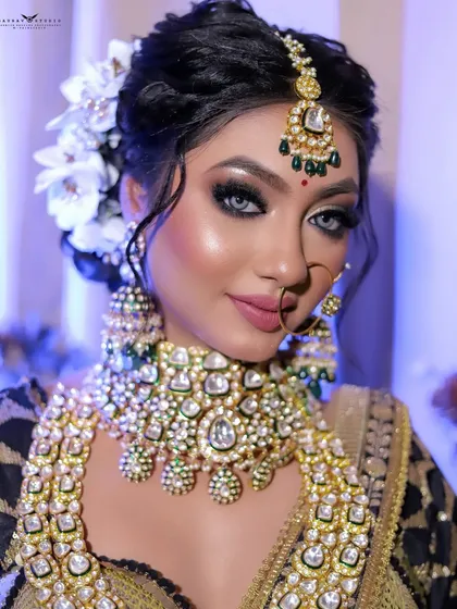 This close-up highlights a bold, smokey-eye makeup look paired with heavy kundan jewelry. It shows my versatility in capturing different bridal styles, from soft and subtle to dramatic and glamorous.