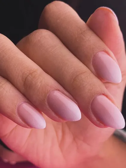 A clean and simple milky pink ombré, offering a "your nails but better" look that is effortlessly chic.
