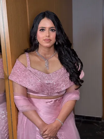 Harsha, looking pretty in pink for her Roka. We went with a soft pink monochromatic look, with shimmery pink eyeshadow and a matching lip, which looked beautiful with her embellished lehenga.