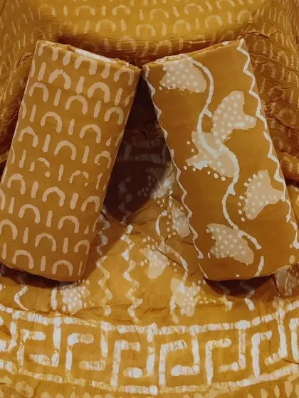 A cheerful mustard yellow block print set, perfect for a sunny day out.