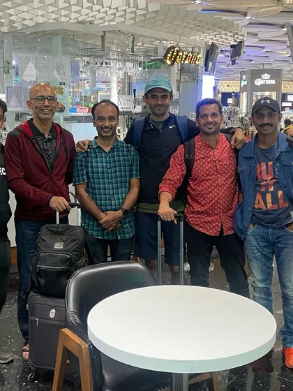 The journey doesn't end at the finish line. Here's our crew at the airport after the Mumbai marathon, tired but happy, sharing stories of the race.