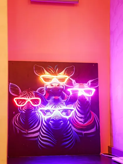 More of the custom neon artwork used throughout the store launch. These pieces served as both decor and conversation starters, reinforcing the brand's artistic and playful character.