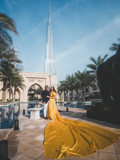 Take your pre-wedding shoot to the next level with our glamorous mustard yellow trail gown. This dress was used for a stunning photoshoot in Dubai, proving our collection is perfect for creating high-fashion, destination-style images.