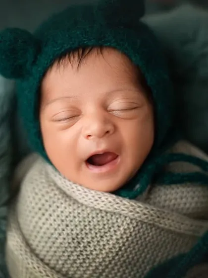 A sleepy yawn from our little bear. Even when they're getting tired, they provide the most adorable photo opportunities.