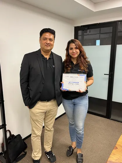 Receiving a certificate of participation after the Content Design Lab. I believe in continuous learning and am always looking for opportunities to sharpen my own skills as a trainer.