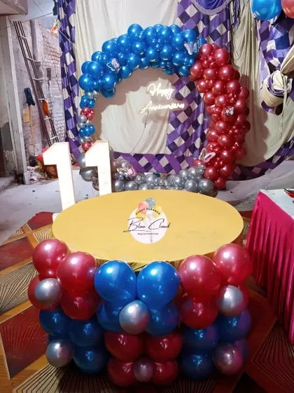 A Spiderman-themed anniversary decoration with a red and blue balloon ring, showing versatility for any fun-loving couple.