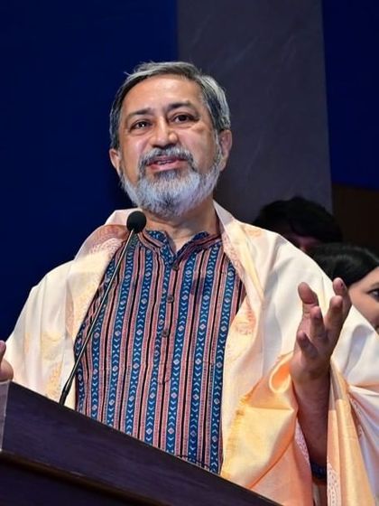 A full-length shot of me on stage receiving the honor from Rotary Ullal, a moment that inspires me to undertake more challenging projects.