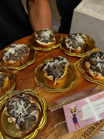 Creamy Mushroom Crostini served on elegant golden plates. The presentation is just as important as the taste.